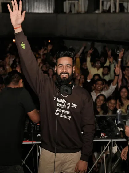 Waving to the incredible crowd at Flo Club in Bengaluru. The energy exchange between the DJ and the audience is everything, and I always make sure we are all on the same wavelength.