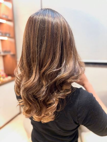 A fresh hair color makes everything feel new. This beautiful balayage adds brightness around the face and through the ends for a perfect, natural-looking glow-up.