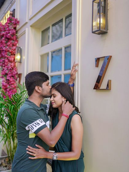 This couple's connection is the focus of this intimate urban portrait. The soft lighting and stylish setting create a very romantic atmosphere.