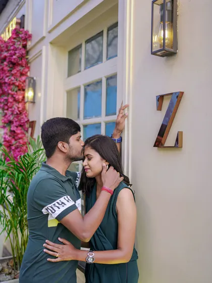This couple's connection is the focus of this intimate urban portrait. The soft lighting and stylish setting create a very romantic atmosphere.