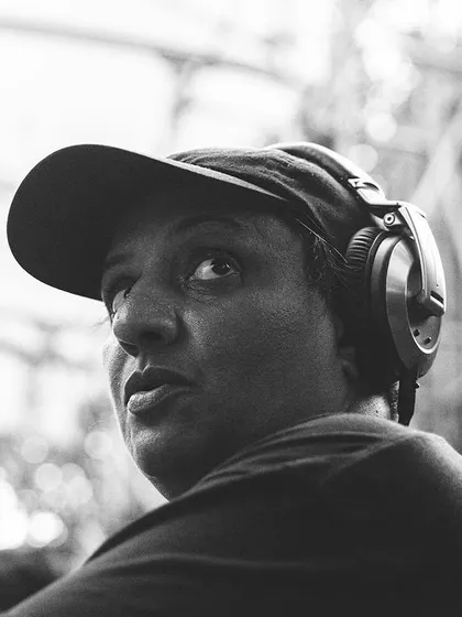 A quiet moment of focus before the beat drops. This captures the artist side of my work, the thought and preparation that goes into curating the perfect sound for each unique crowd and venue.