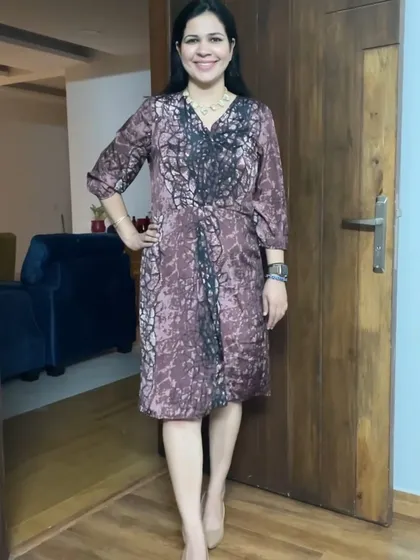 This is the "before" picture of a dress with a slightly odd fit. I knew the fabric had potential, so I decided to upcycle it.