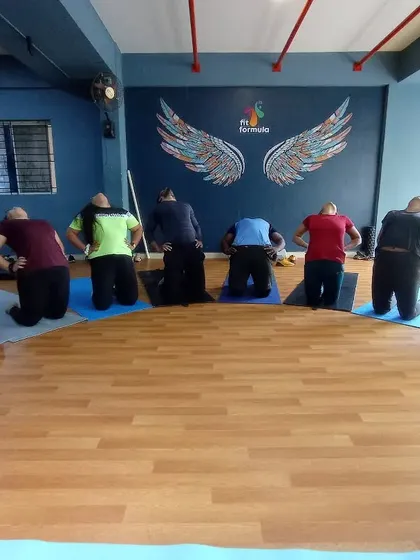 The Ustrasana, or Camel Pose, is a powerful heart-opener. In our classes, we guide the group through each step to ensure everyone practices safely.