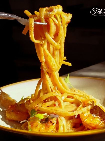 My spaghetti is so good, you’ll be tangled in love with every bite. This close-up shot shows off the perfect twirl.