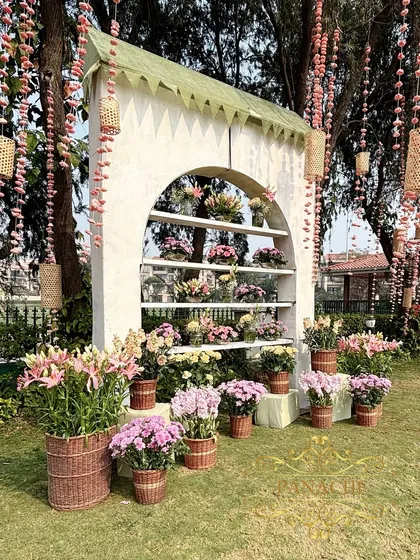 A unique and beautiful photo booth designed to look like a bouquet shop, filled with fresh flowers in pastel shades.