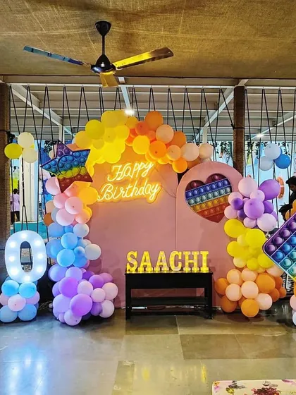 Another angle of the Pop-It themed birthday setup, showing the full scale of the decorations in our spacious banquet area.