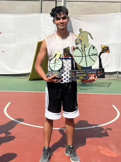 The Most Valuable Player of the U17 5x5 tournament holding his well-earned trophies. We make sure to celebrate standout performances.