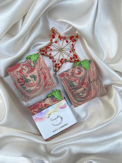 The Jolly Jamboree soap, a cheerful mix of Christmas colors.