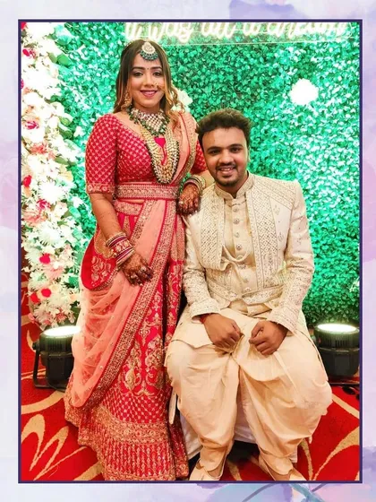 A perfect portrait of our clients. The groom is styled in a short sherwani with dhoti pants, a comfortable yet very stylish choice for any wedding function.