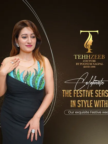 Another look at our black gown with a unique green and blue embellished bodice. It's a perfect outfit to celebrate the festive season in style.
