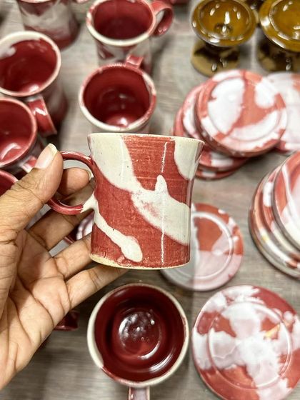 Another unique piece from the Flamingo series, next to a stack of matching coasters.