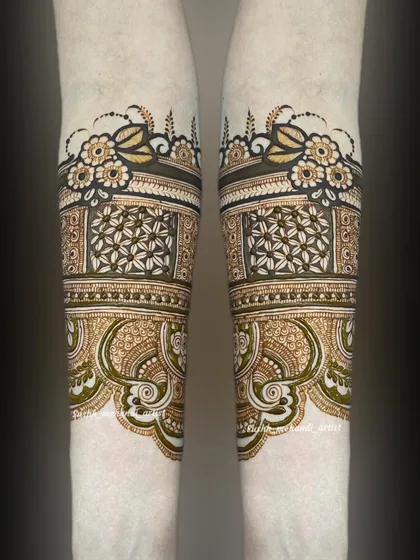 The clean and repeating patterns on the forearm create a beautiful cuff. This part of the design is just as important as the hands.