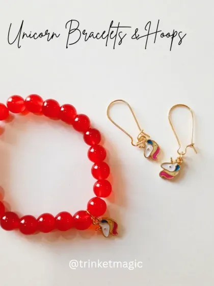A bold and bright unicorn set with a red beaded bracelet and matching unicorn hoops. This vibrant color is sure to make a statement.