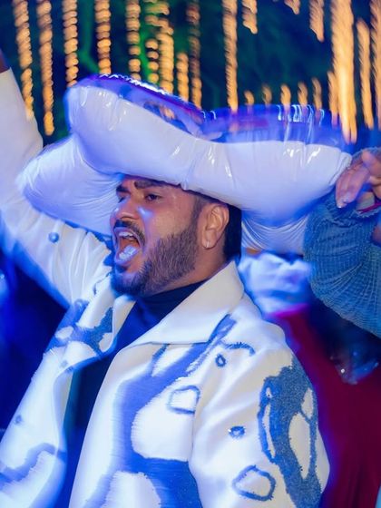 The energy of the decor is matched only by the energy of the guests. The event was filled with playful props like inflatable unicorns, encouraging everyone to let loose and become part of the carnival.