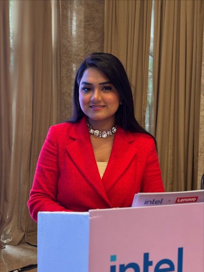 A smile from behind the desk at the Lenovo and Intel event. It’s important to be prepared and welcoming as guests arrive.