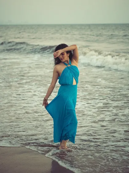 Capturing a pensive, story-driven moment with Ridhima. The soft, overcast light on the beach created a beautiful, moody atmosphere.