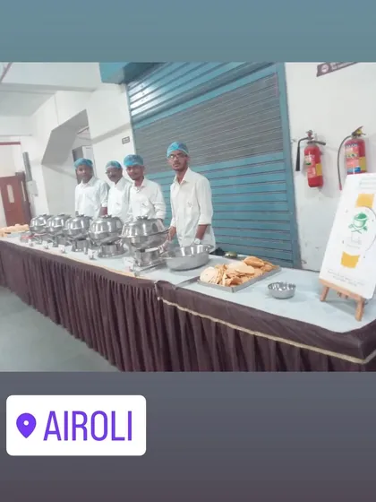 Our team wearing hairnets for hygiene at an event in Airoli. We take food safety and cleanliness very seriously.