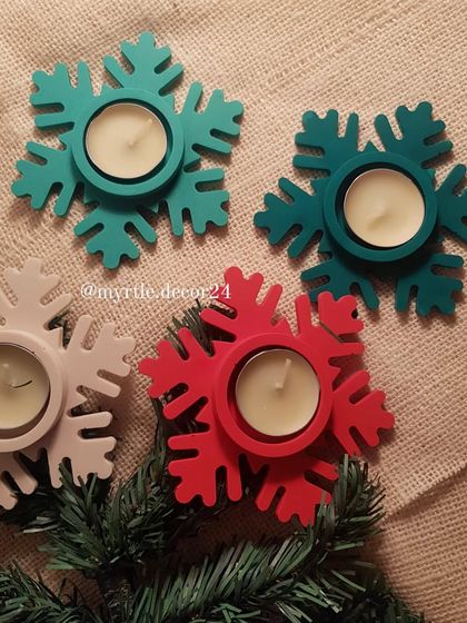 A different angle of the Snowflake T-light holders, showing how they look from above. They make a wonderful, easy gift for friends, family, or colleagues.