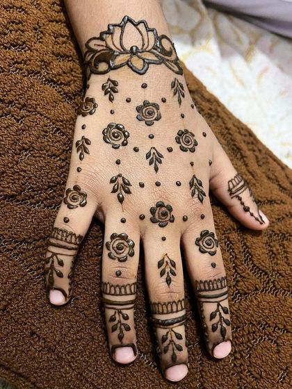 The same scattered floral design on a different background.