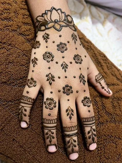The same scattered floral design on a different background.