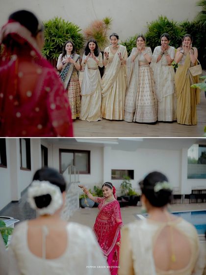 A candid moment showing the bride's first look with her bridesmaids, their surprised and happy expressions are priceless.