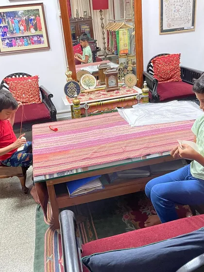 My grandsons completely absorbed in their embroidery projects. It is a wonderful, fruitful way to spend vacation time, developing focus and creativity.