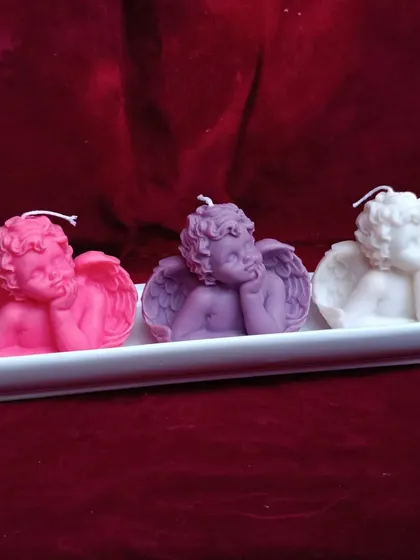 These cherub angel candles are a heavenly gift for baptisms, baby showers, or as a thoughtful gesture. Available in multiple colors, they are crafted from natural soy wax to bring a peaceful ambiance to any space.