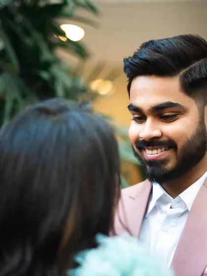 A groom-focused shot, capturing his happy expression as he looks at his bride. It’s a beautiful way to show his perspective.