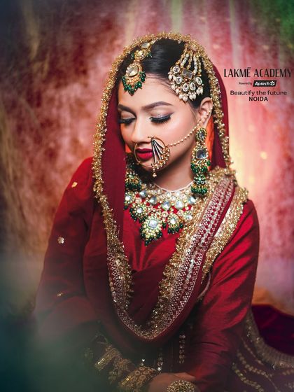 A close-up portrait of a Muslim bride, showcasing the perfect red lip and defined eye makeup. Our courses cover techniques to create looks that are both bold and timeless.