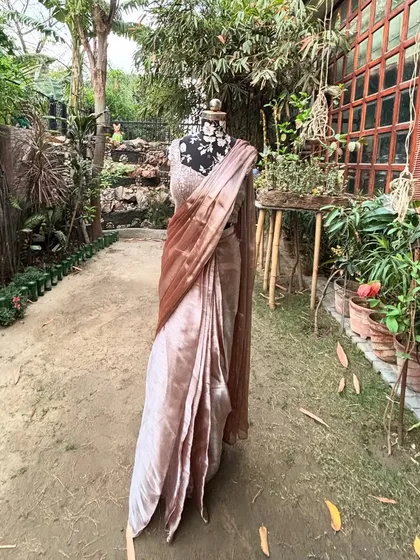 A closer look at the 'SAJEELI' saree, draped on a mannequin in our garden. The ombre effect of the fabric is subtle yet stunning.