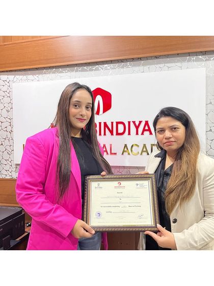 Dressed for success! This graduate is ready to start her professional journey after completing our comprehensive makeup course.