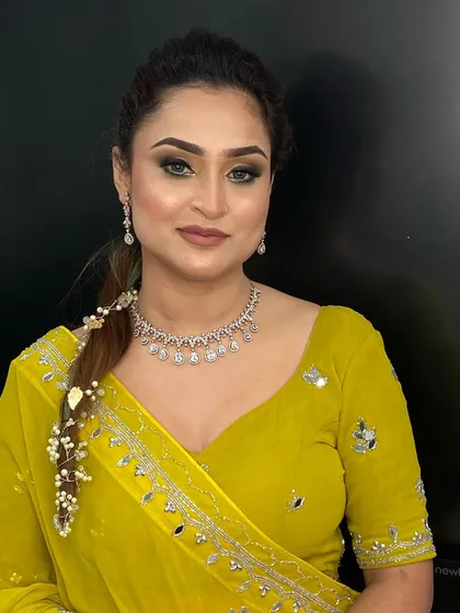 Creating a flawless engagement or party look is a key skill. This is an example of a soft glam makeup style, focusing on luminous skin and a smoky eye, perfect for any special occasion.