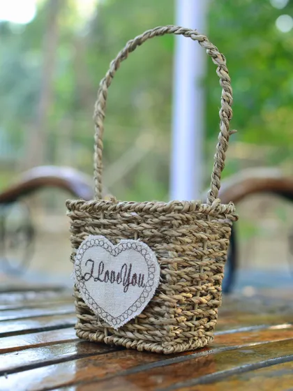 For a simple and heartfelt gesture, I offer these small, hand-woven baskets with an 'I Love You' message. They are perfect for creating a small, customized gift for someone special on an anniversary or Valentine's Day.