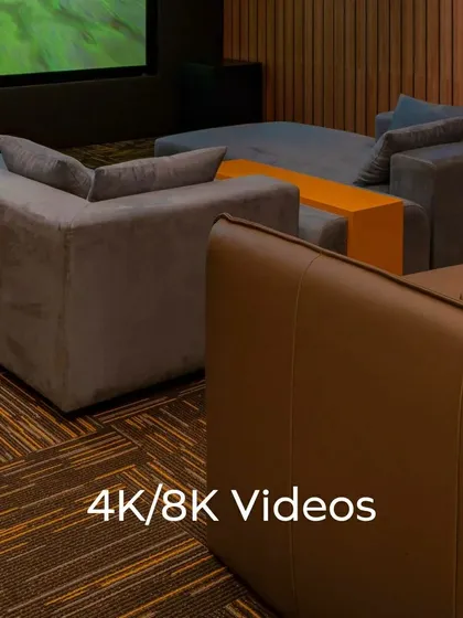 Every detail matters in a custom home theater. This series of shots highlights the clean lines of the ceiling lighting, the texture of the wood-paneled acoustic walls, and the high-quality finish of the leather recliner seats, all contributing to a premium experience.