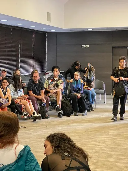A student asking a question during a workshop. These interactions are my favorite part of teaching, as they lead to deeper understanding for the entire group.