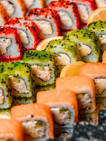 A vibrant and colorful close-up of our assorted sushi rolls. This image highlights the freshness of the ingredients and the meticulous craftsmanship that goes into each piece.
