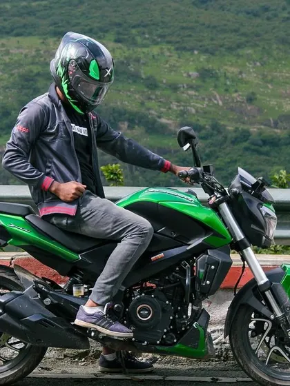 A classic weekend escape for any Bengaluru biker. Here's one of our members with his stock green Dominar 400 at Nandi Hills, a regular destination for our breakfast rides.