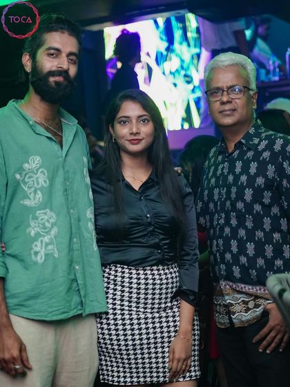 A group of guests posing for a photo.