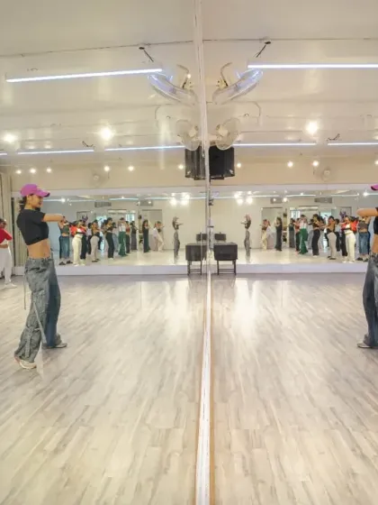 A reflection shot from Mekhola's waacking workshop, capturing the symmetry and precision of the style. Our mirrored studio is the perfect place to perfect your lines.