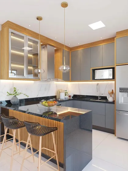 Here is a 3D concept for a U-shaped modular kitchen that maximizes counter space and storage. The design features a breakfast bar with stylish seating, a mix of grey and wood-finish cabinets, and under-cabinet lighting for task-focused brightness. It’s a perfect example of how I plan for both cooking and socializing.