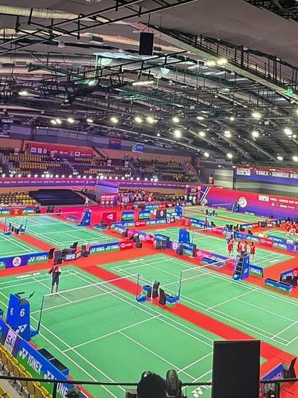 A wide view of the venue for the Yonex-Sunrise BWF World Junior Badminton Championships. For our 10th year of partnership, we managed the entire event, from court setup to fan engagement zones.
