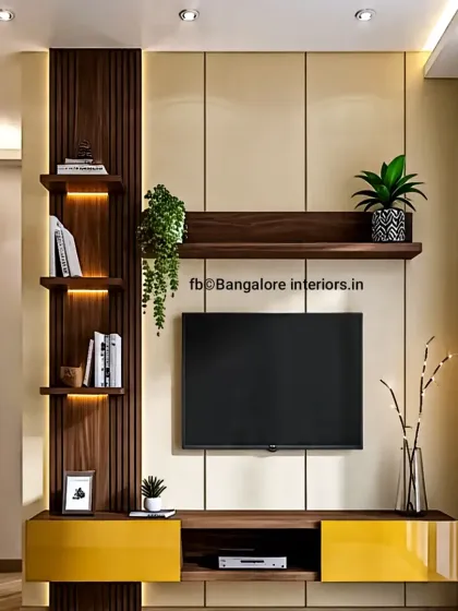 We added a pop of color to this living room with a glossy yellow and wood TV console. The design is complemented by a dark wood fluted panel with backlit floating shelves, creating a balanced and visually interesting entertainment wall.