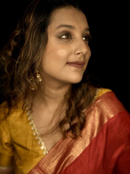 A close-up portrait from my Padwa celebration, focusing on the warm, dewy makeup and traditional jewelry.