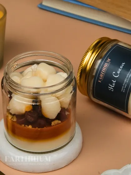 A closer look at the Hot Cocoa candle, with layers of "chocolate" and "marshmallows" made from soy wax.