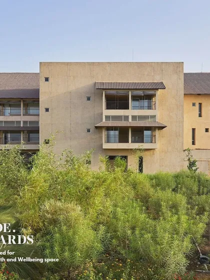 The award-shortlisted JSW Sanjeevani Hospital in Dolvi, nestled within its natural landscape. Our design aimed to create a healing environment that feels connected to the earth, using natural materials and ensuring green views from every part of the building.