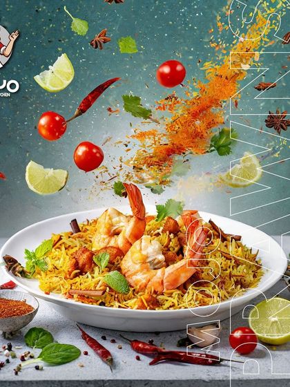 My Prawns Biryani, served on a plate. I use fresh prawns and a special spice mix to create a light yet flavorful seafood biryani.