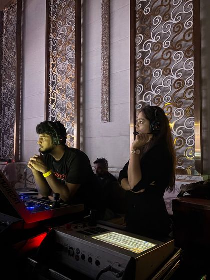 Our show callers, equipped with headsets, intently watch the stage at the TATA Sierra launch. Constant communication and focus are key to managing a live show.