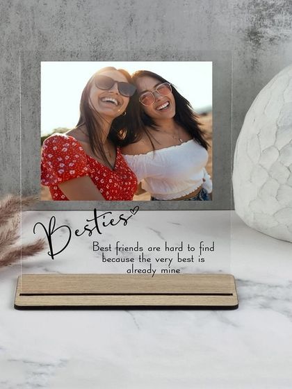 This acrylic photo plaque is a wonderful gift for your best friend. It features your favorite "Besties" photo along with a heartfelt quote, all set in a modern wooden stand.