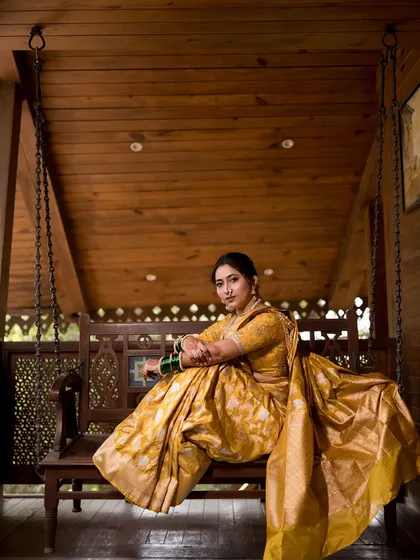 A powerful and poised portrait of the bride on the swing.