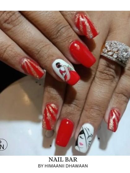 A unique take on festive nails. This set features artistic face illustrations on a white nail, paired with glittery red nails for a modern yet traditional vibe.